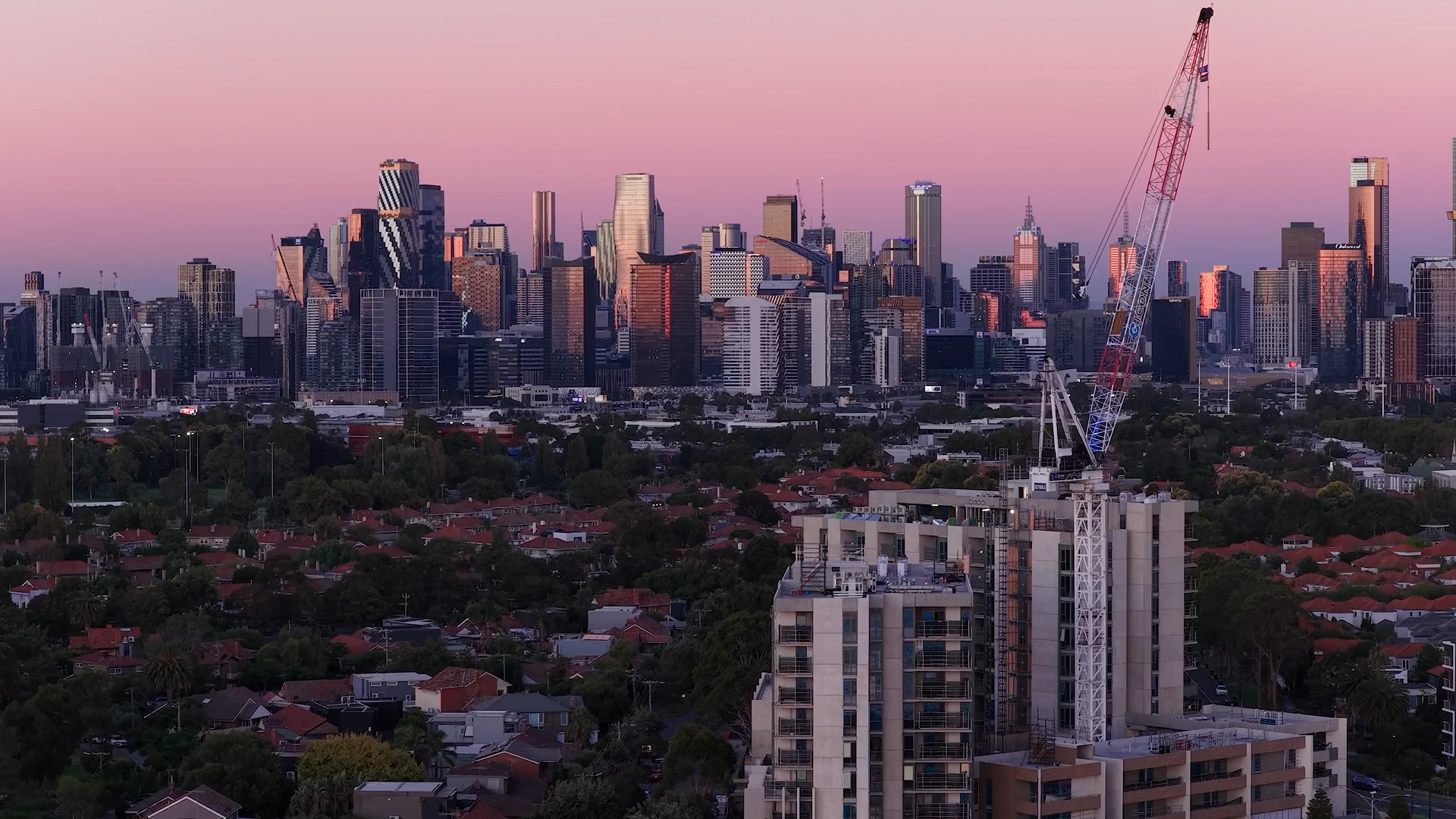 Melbourne city skyline, crane in foreground